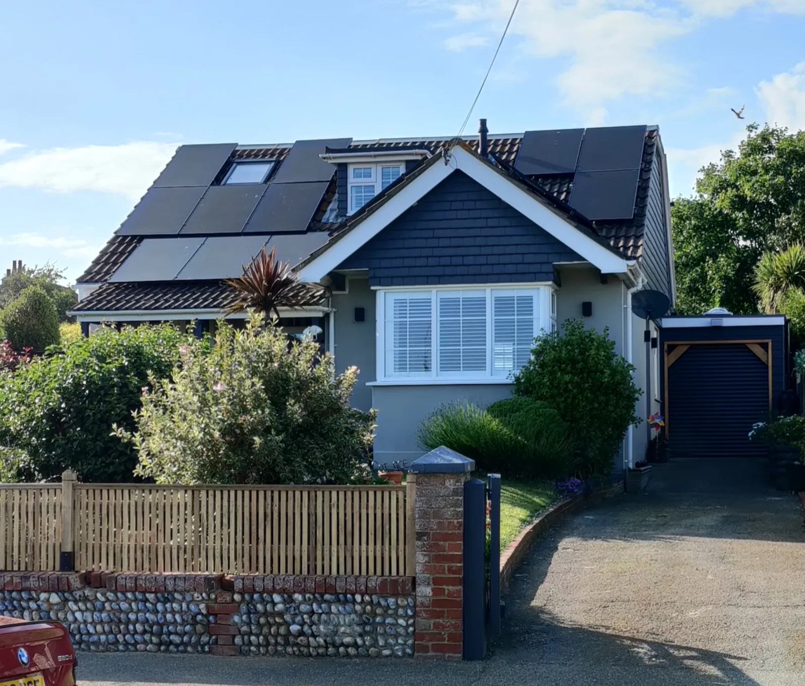 bungalow with solar panels on roof