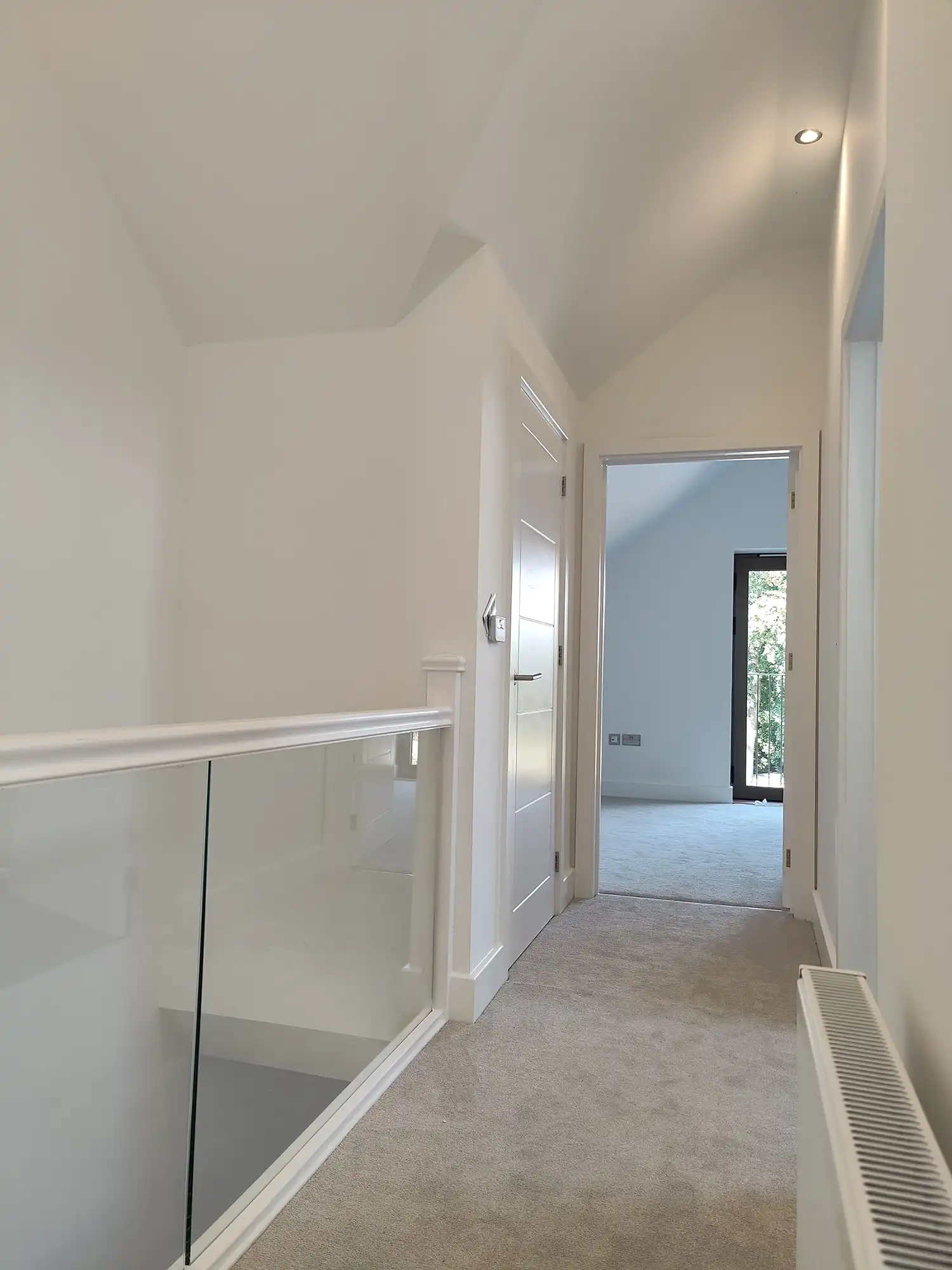 loft conversion with carpeted flooring
