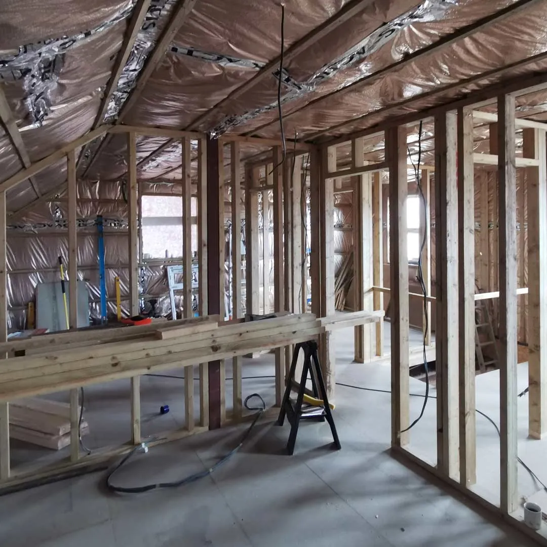 timber framed building under construction